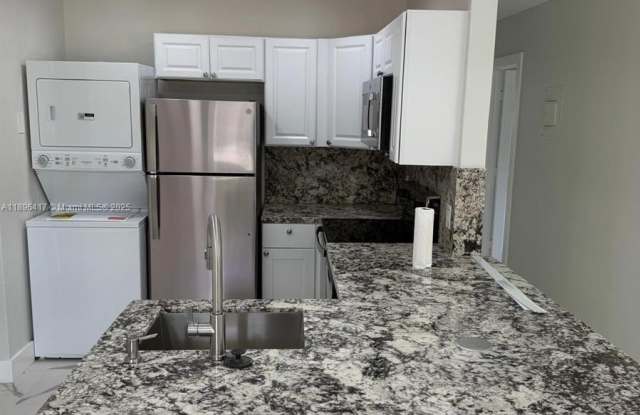 1050 NW 25th Way photos photos