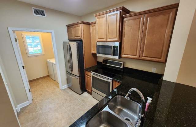 50% off this beautiful 2/2 Bouchelle Condo with private garage, see details* photos photos