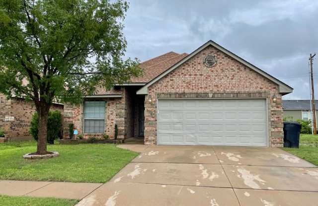 Beautiful 4 bed 2 bath home with a spacious up to date kitchen! photos photos