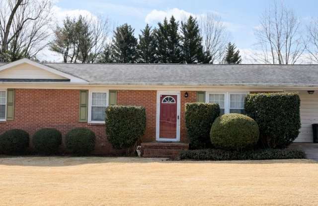 FENCED IN YARD AND LARGE DETACHED TWO CAR GARAGE LOCATED IN THE DESIRED TRAVELERS REST!!! photos photos