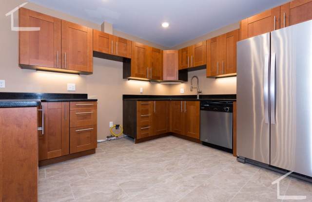Huge, newly renovated 2 level 5 bed unit near the Green Line! photos photos