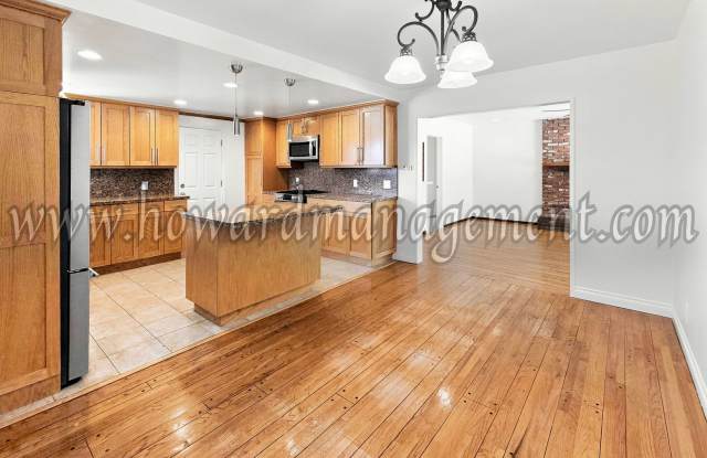 One level home with central A/C and grand backyard with pool. Gallery 4
