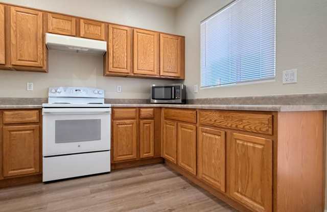 Beautiful plank flooring in this 4 bedroom home in Avondale Gallery 3