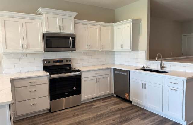 Ranch townhome with 2 stall garage. Spacious 2 bedroom/2.5-bathroom, 1st floor laundry photos photos