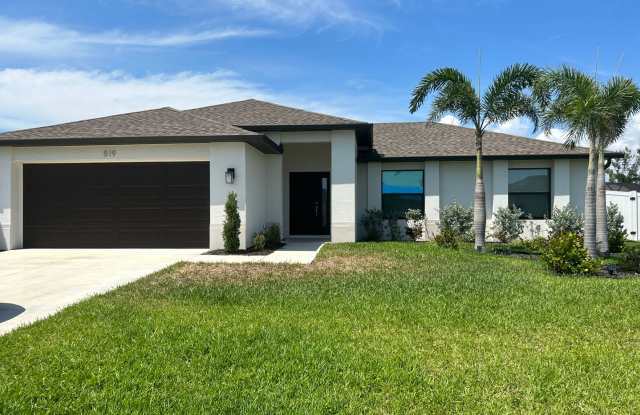Move-In Ready 3BR Home in SW Cape Coral with Fenced Yar+Screened Lanai+Lawn Care Included+Pet Friendly! photos photos