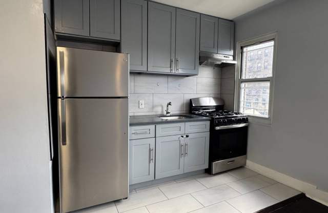 1254 White Plains Rd photos photos