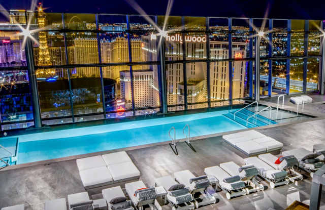 Sky-High Living at CityCenter – Furnished Corner Suite with Breathtaking Strip & Mountain Views Gallery 1