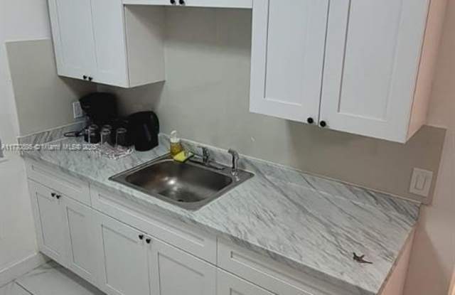 7345 Dickens Ave photos photos