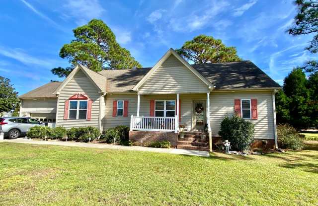 Water Views from this FULLY FURNISHED Spectacular Home in Gated Marina Community! - 903 Caracara Drive, Fairfield Harbour, NC 28560