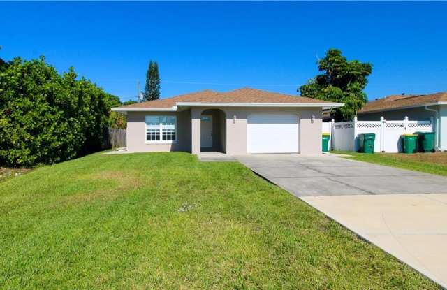 2/2 ANNUAL UNFURNISHED HOME - Big Yard with New Fence in Naples Park! – Quick Move-In, No HOA photos photos
