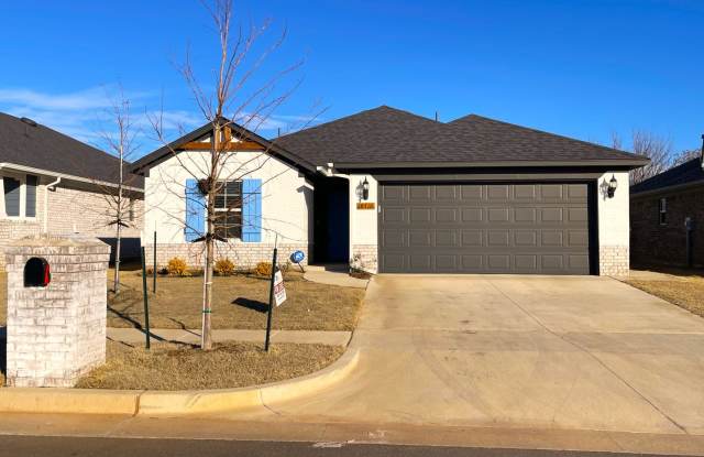 Welcome to this beautiful brick home located in the desirable neighborhood of Edmond, OK. photos photos