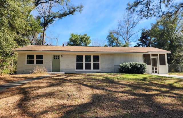 Charming 3-bedroom, 1-bathroom home on a half acre lot on the Southside! photos photos