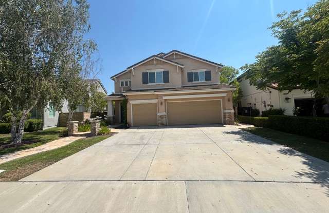 Spacious 5-Bedroom Home with Community Amenities in Valencia's Tesoro Del Valle! photos photos