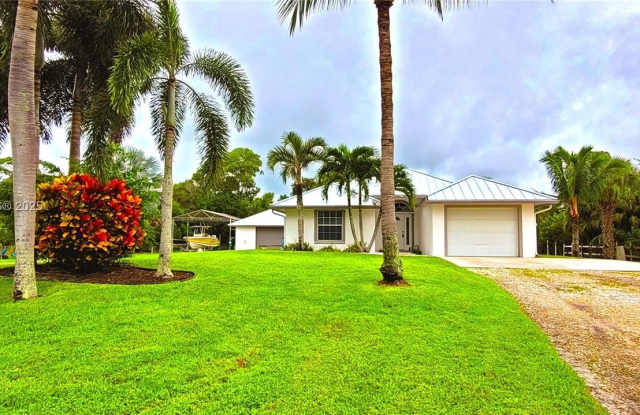 15255 N 97th Dr - 15255 97th Drive North, Jupiter Farms, FL 33478