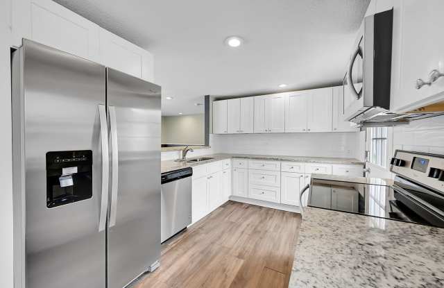 Updated 4-Bedroom Westminster Home with Fenced Yard, Solar Panels & Garage Gallery 4