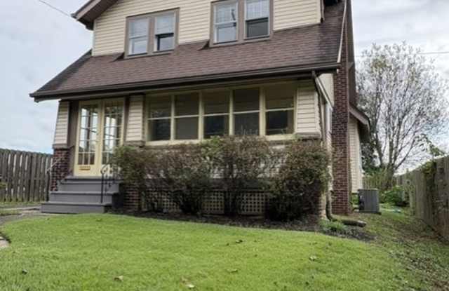 Beautiful 3BR/1.5BA Akron Home | Updated Kitchen | Garage | Enclosed Porch Gallery 3