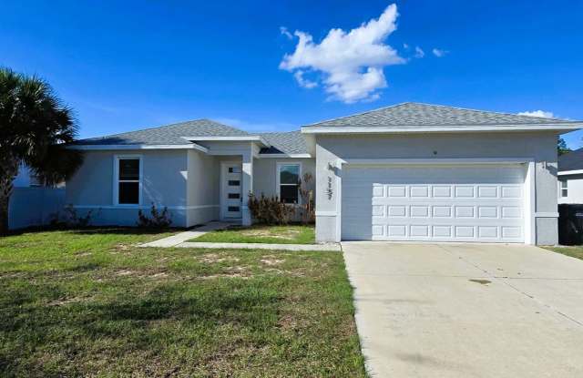 Spacious 4-Bedroom Home with Modern Kitchen  Open Living in Poinciana! photos photos