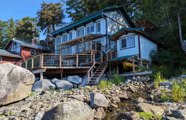 Rare Find 3BD/1.5BA Home w/Stunning Hardwood Interiors, Sauna, Lg Covered Decks, Play House + More photos photos