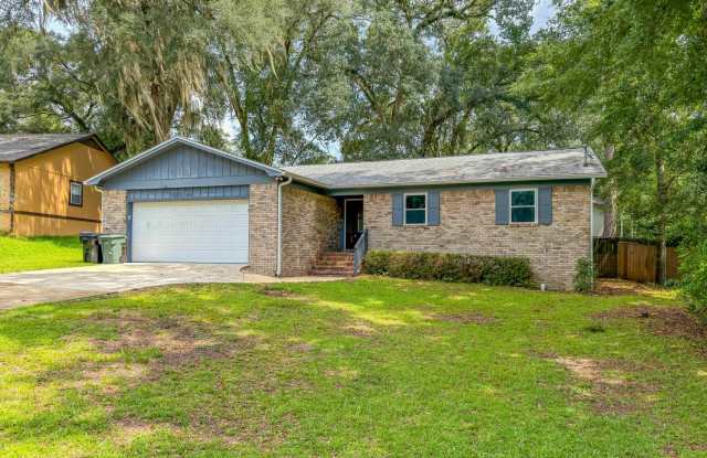 LOVELY NE 3/2 w/ Granite Counters, Stainless Steel Appliances, Plank Vinyl Floors, Garage, & Large Fenced Yard Avail NOW for $2100/month! photos photos