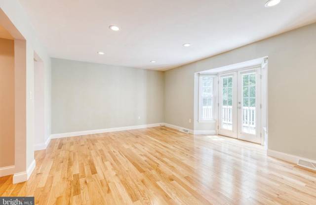 Welcome to this beautifully renovated 3-bedroom, 2-full and 2-half-bath home, ideally located in Crofton’s sought-after Triangle Gallery 4