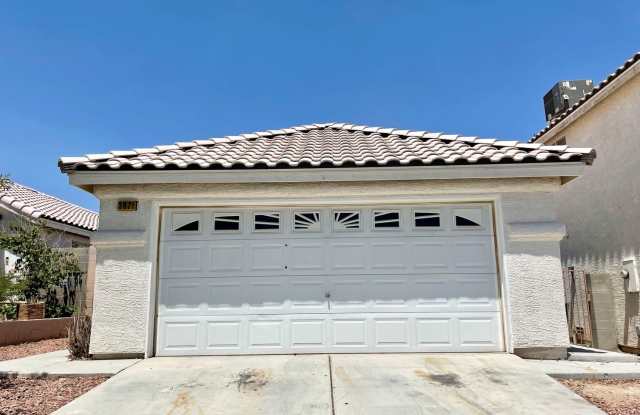 A SPACIOUS SINGLE STORY WITH TILE FLOORING, 3 BEDROOM  2 BATH HOME LOCATED NEAR THE NELLIS AIR FORCE BASE WITH NEARBY SHOPPING CENTERS AND FAMILY PARK. MINUTES AWAY FROM THE I-15 FREEWAY! photos photos