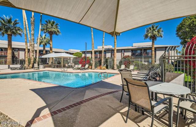 Luxury and Resort like Living at Scottsdale Park Place!!!  Tile throughout, light, bright and Private patio not looking at your neighbors over Greenbelt area!!!  Pool!!!  BBQ areas and a Fitness Center!!!  Time to call this HOME!!! photos photos