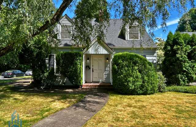 Charming 4 Bedroom Home with Hardwood Floors, Gas Fireplace & Large Fenced Yard photos photos