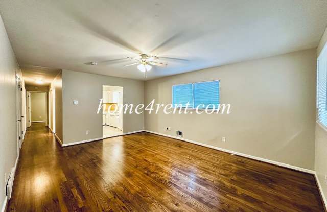 Great home in the desirable Waldo area with wood floors, fenced yard and basement! Gallery 3