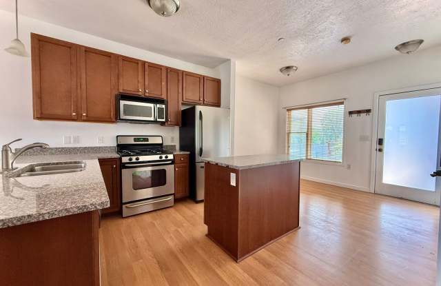 2BR/2BA Condo Near TRAX | Mountain Views, Private Balcony & Garage Parking Gallery 4