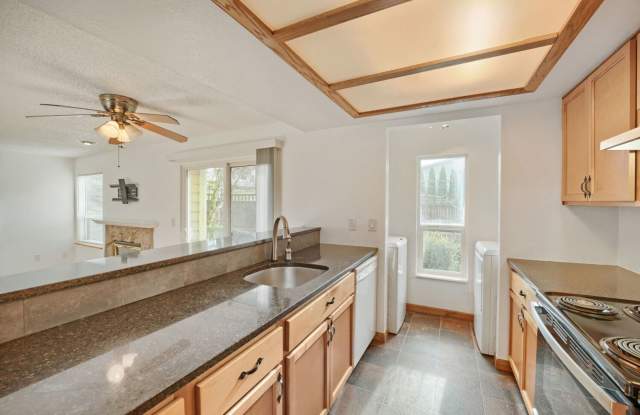 AVAILABLE NOW! 2BR/2BA Condo – Awesome Location! Glossy Hardwoods, Granite Countertops, W/S/G Included!! photos photos