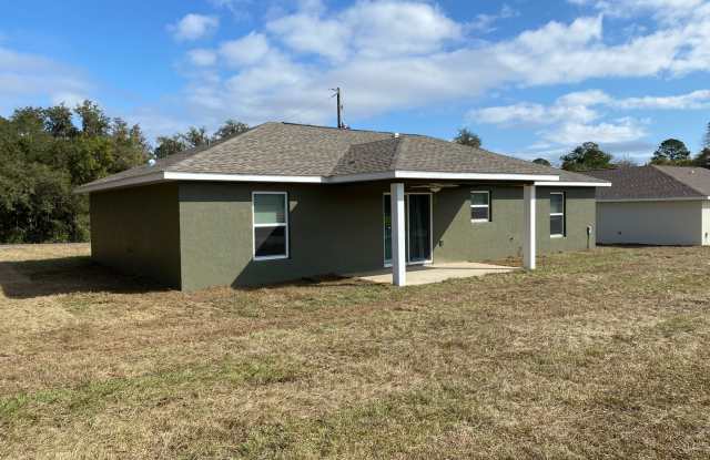 Custom Home - Desirable SE Ocala Neighborhood 3/2/2 **Won't Last** Gallery 1