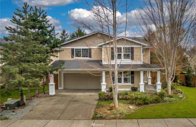 Spacious 5-Bedroom Home with Backyard Oasis in Quiet Suburb photos photos
