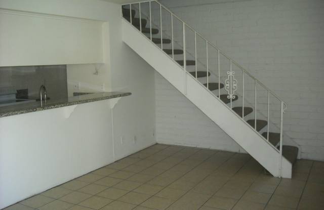 Enjoy townhouse living close to the beach. Gallery 4