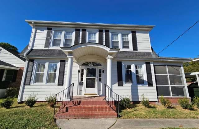 Cozy three bedroom home, updated kitchen, ample living space, pet friendly with fenced yard and off street parking Gallery 1