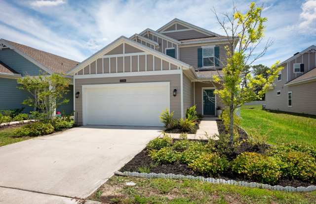 Spacious 4-Bedroom Home with Screened Patio in Northside Jacksonville photos photos