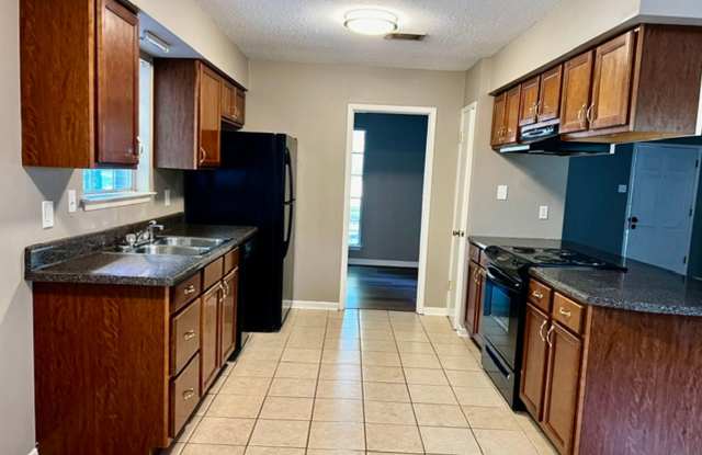 3/2 Brick home with new floors, new paint, large yard Gallery 3