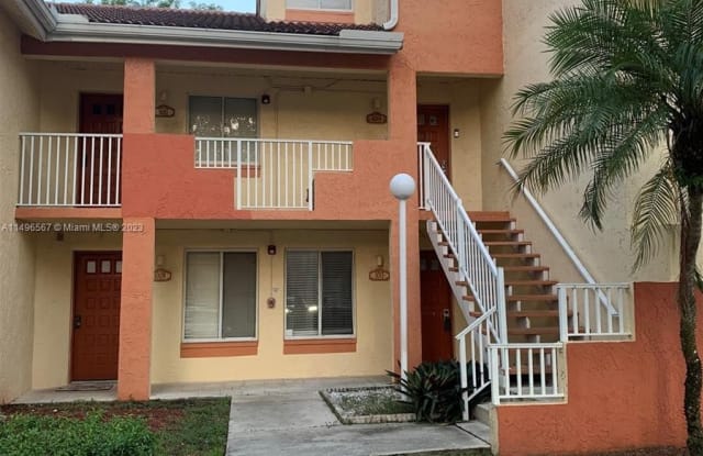 1013 Coral Club Dr - 1013 Coral Club Drive, Coral Springs, FL 33071