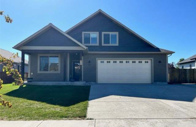 Charming 4-Bedroom Home with Spacious Lawn in Bozeman, MT! photos photos