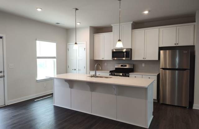 Beautiful End Unit Townhome located in the Towns at Mallard Mills community! Gallery 4