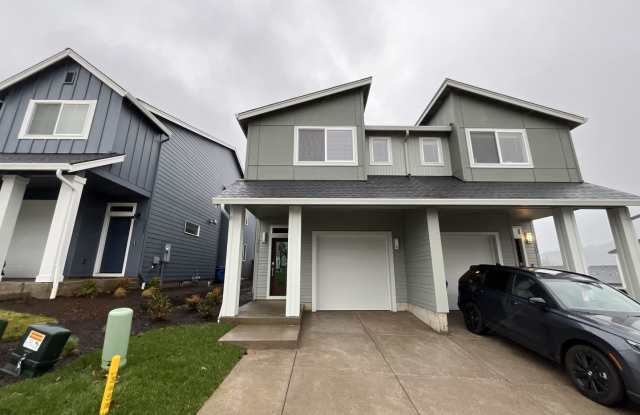 Exceptional 3-Bedroom Modern Home with Island Kitchen, Spacious Living, and Attached Garage photos photos