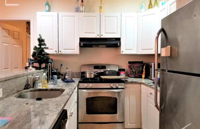 Nicely renovated 3 bed on the Green Line in Brookline. photos photos
