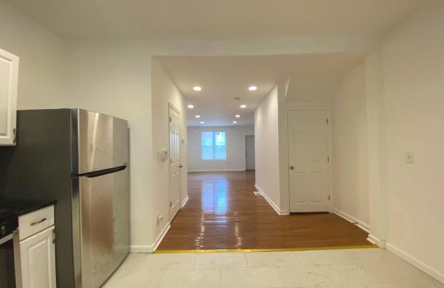 Updated 2-Bedroom Home with Finished Basement and Private Yard Near University City Gallery 4