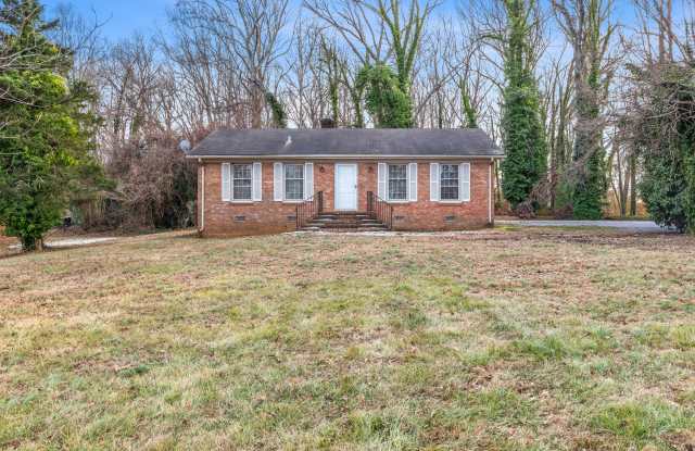 Large Brick Ranch, New Wood Like Flooring Throughout, Just Painted, LR, Den, Sun Room, Carport! photos photos