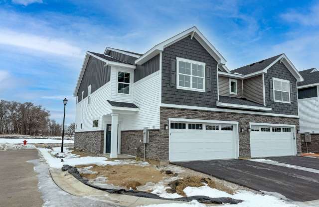 Grandview END UNIT townhome plan in Corcoran’s Hope Meadows community—a brand-new townhome development near Pheasant Acres Golf Course and just a short distance from Elm Creek Park Reserve. photos photos
