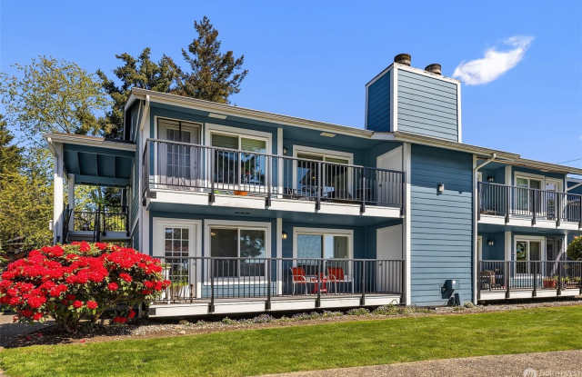 2 Bed 2 Bath Top-Floor Woodridge Condo with Sunset Views & 2-Car Garage Gallery 1