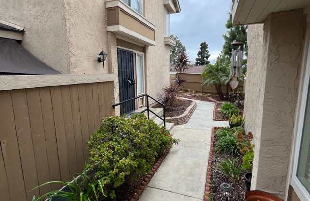 Spacious 2bd/2 bath with private patio in the heart of Paradise Hills.  2 carport spaces Gallery 1