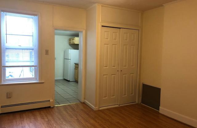 Great Home! Wood Flooring! Updated Kitchen! Wood Cabinets! Granite Counters! Great Living Space! W/D Hook-ups! Lots of Storage! Gallery 4
