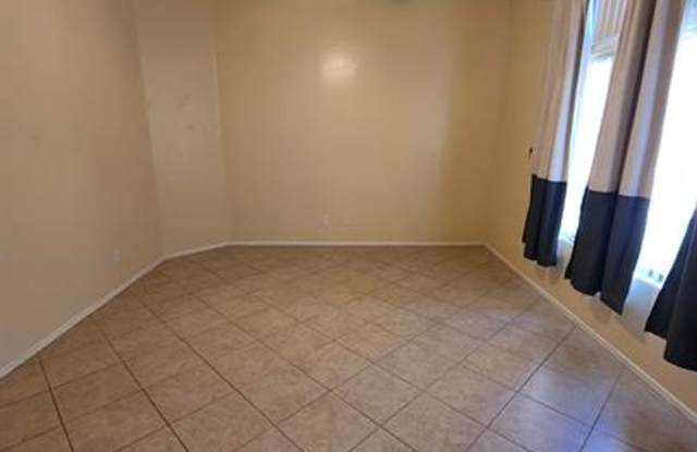 Great 4-Bedroom Home with 3-Car Garage and Large Backyard Gallery 3