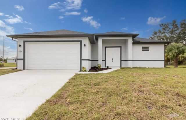 Stunning 3BR/2BA Home with 2-Car Garage  Screened Lanai in Lehigh Acres photos photos