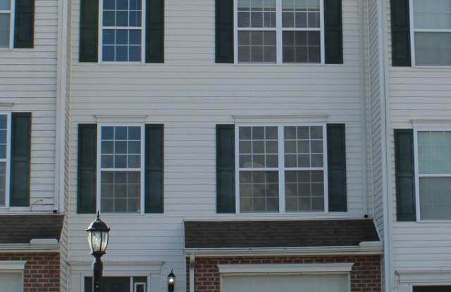 Modern 3-Story Townhouse Living with Garage photos photos